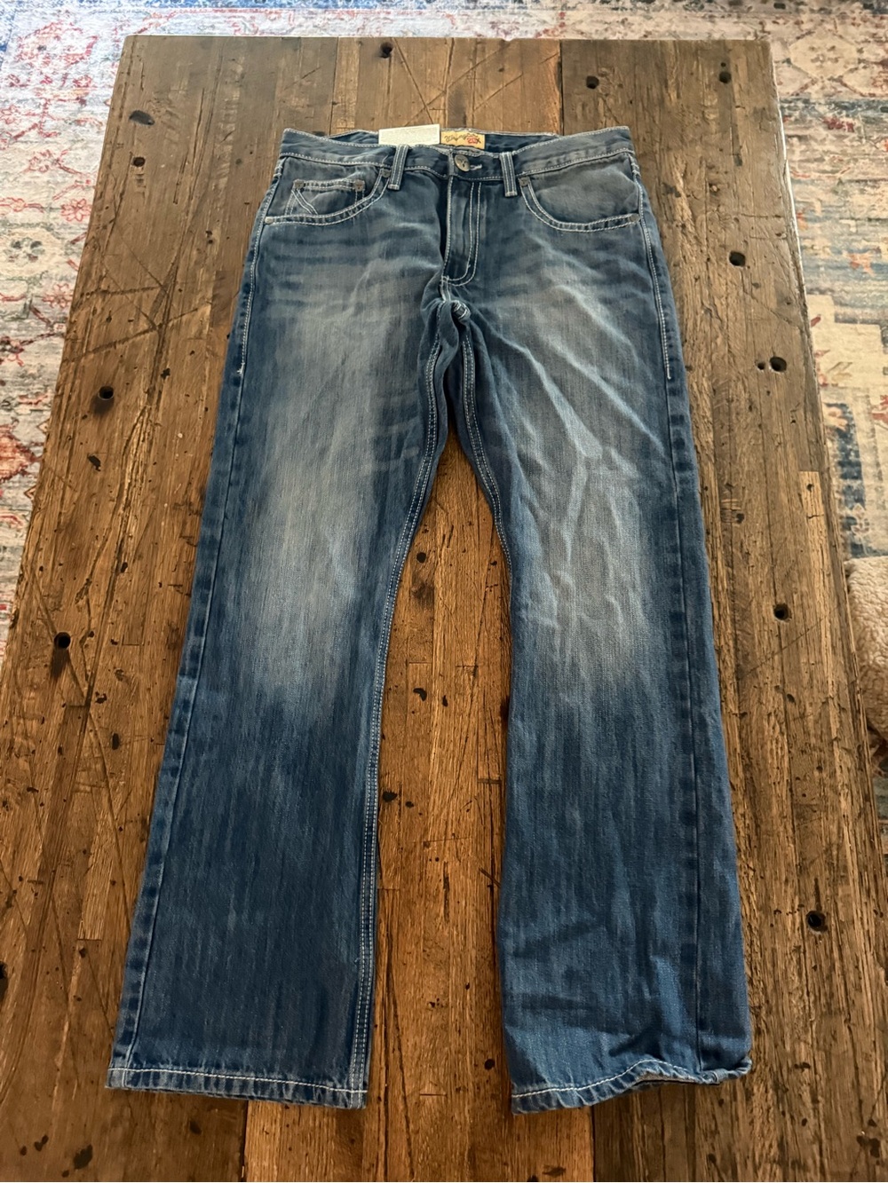 Wrangler Men's Faded Blue Bootcut Jeans